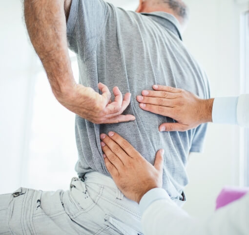 person having back examined