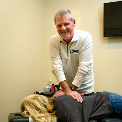 dr hoover adjusting patient's back