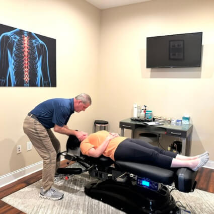Dr Hoover doing neck adjustment