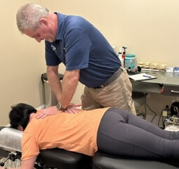 Back Care Plus patient having back adjusted