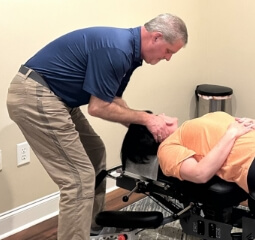 person having back examined