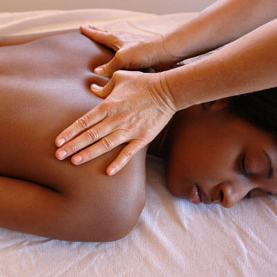 woman getting a shoulder massage