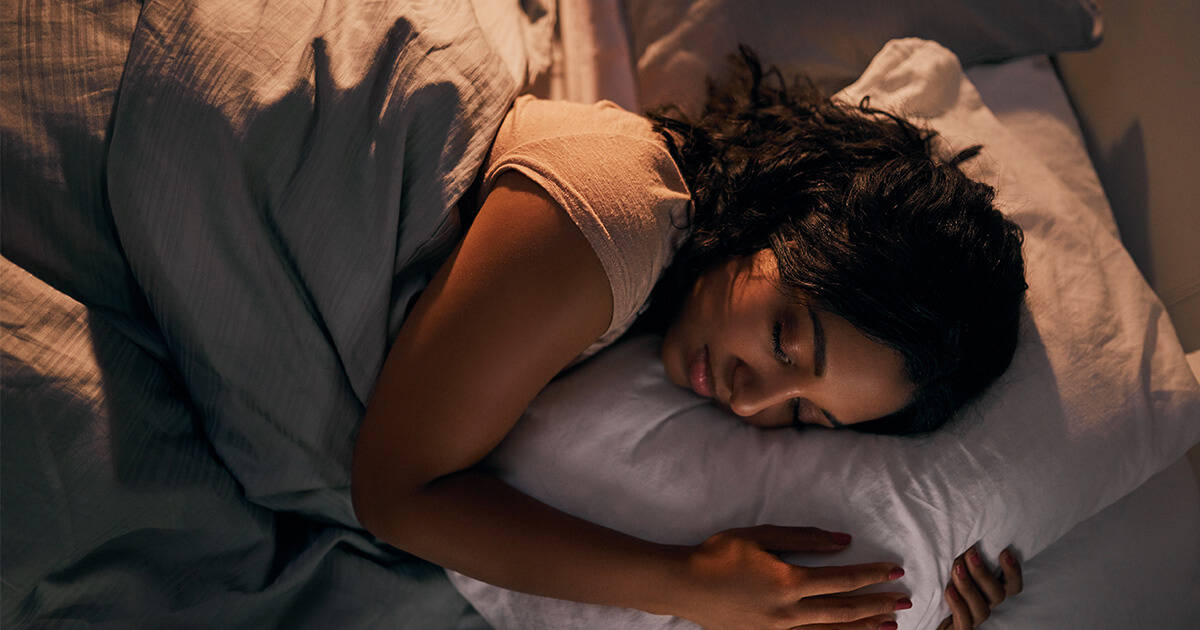 Woman sleeping in bed