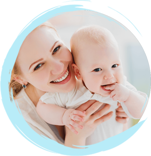 Smiling mom holding her baby