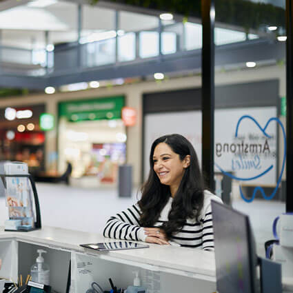 person standing at front desk