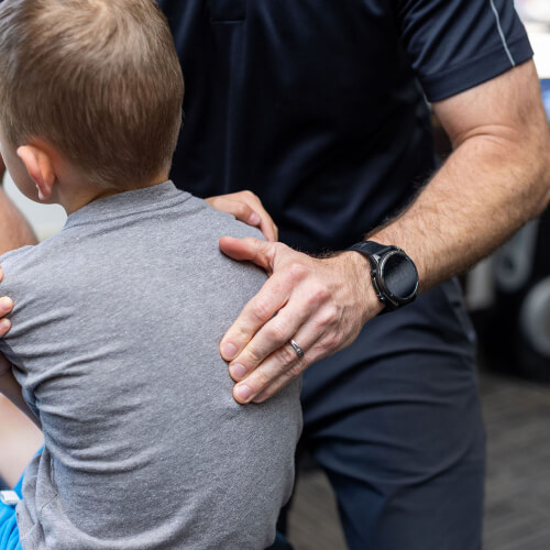 Little kid treated with Chiropractic Care