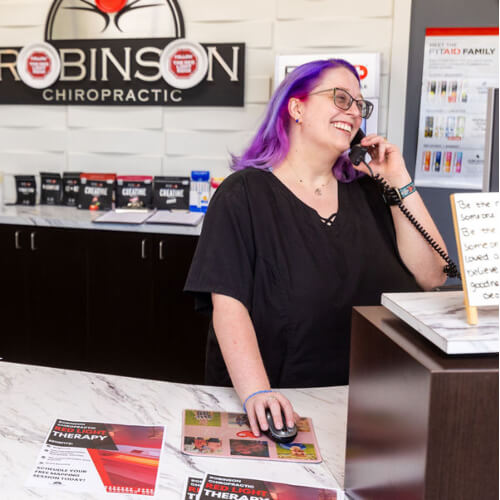 Receptionist talking on phone