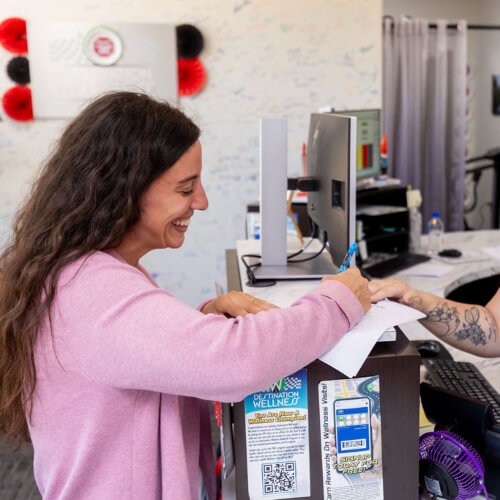 Patient checking in at reception
