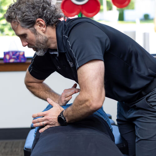 Lower-back adjustment for male patient