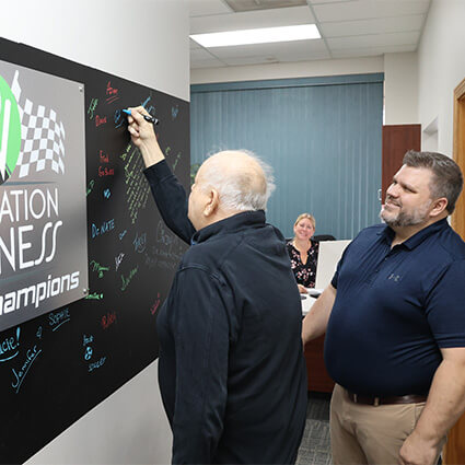 patient signing our wall