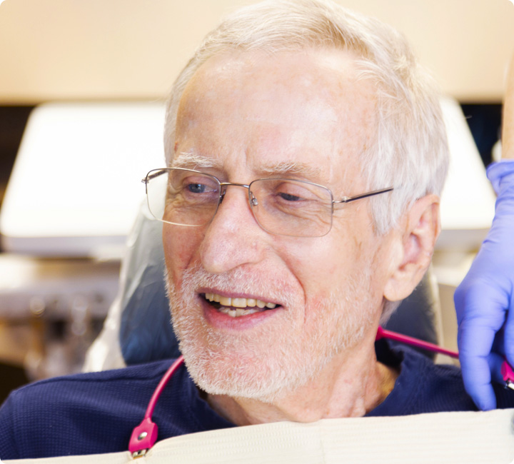 patient smiling in dental chair