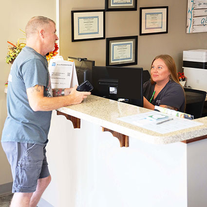 Man at reception desk