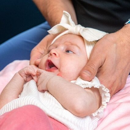 baby having neck adjusted