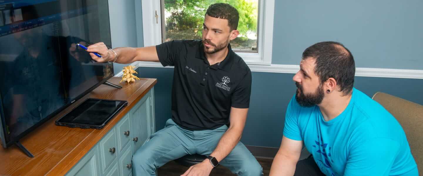 Morristown chiropractor in a consultation with a patient