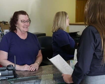 Patient checking in at reception
