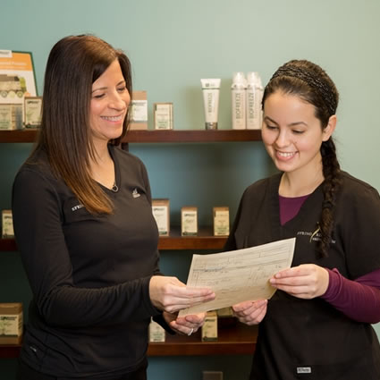 Reviewing paperwork with patient