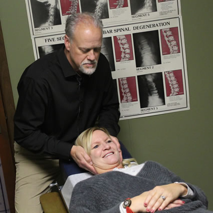 Chiropractic adjustment by Dr. Mark