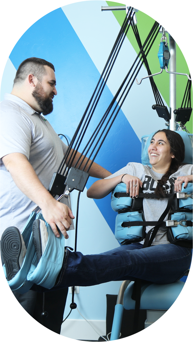 Chiropractor with patient doing therapy