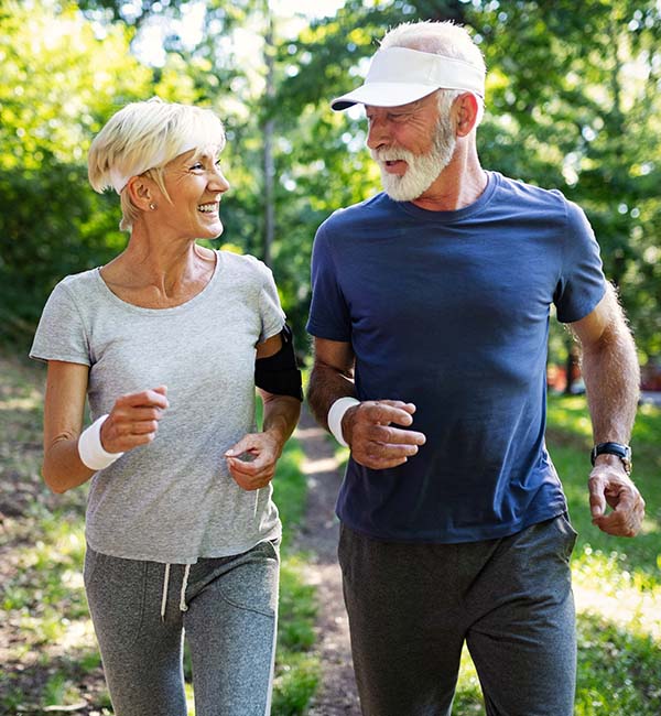 retired couple jogging