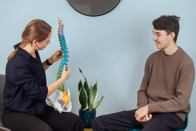 Dr. Laakso of Chiropractic Life  explaining to patient