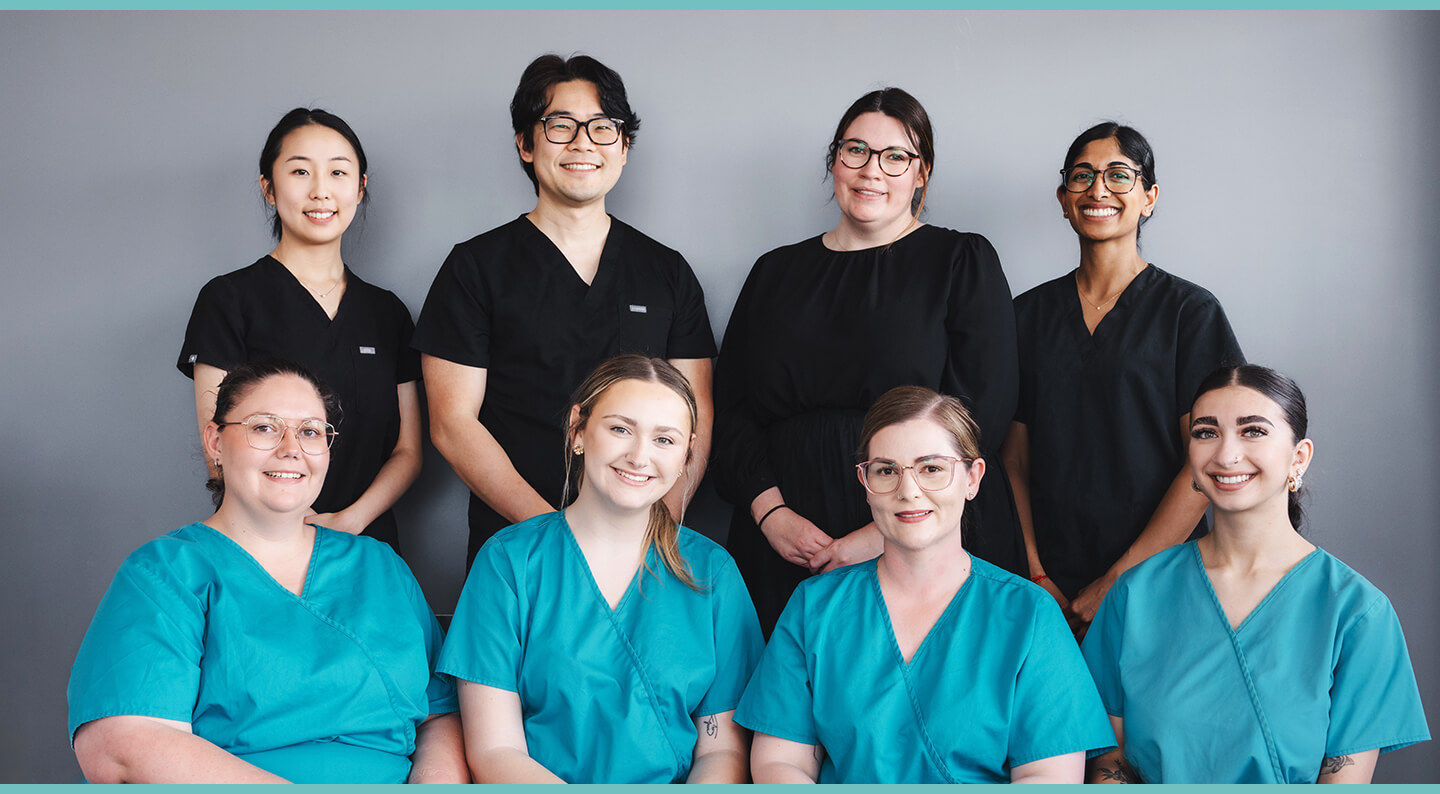 ME Dental team in front of building
