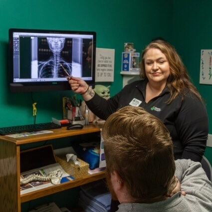 Dr Shipley showing a patient xrays