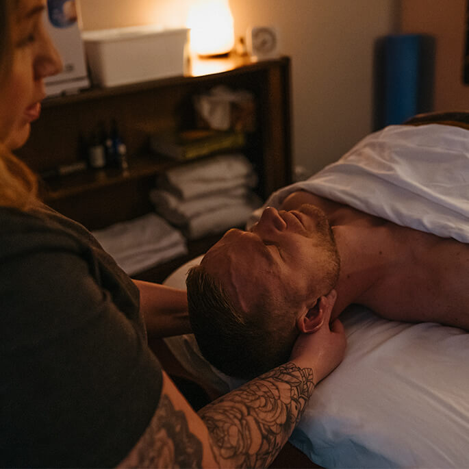 Man getting massage treatment on head