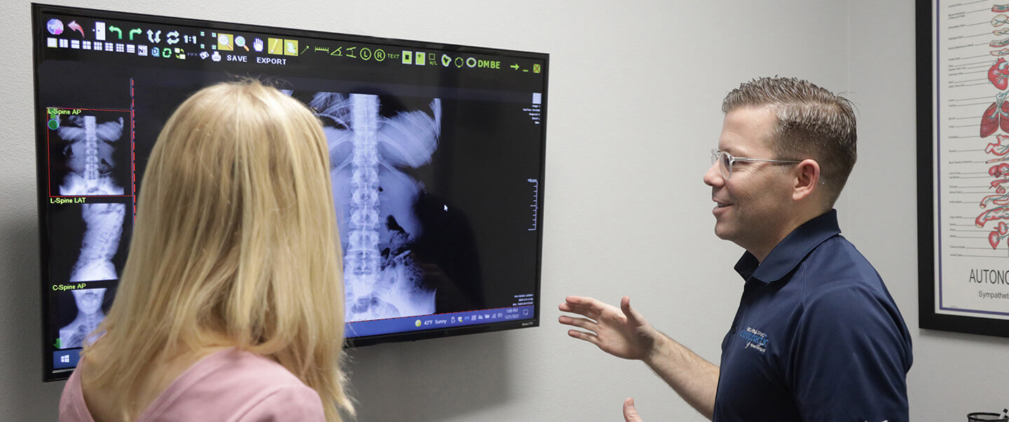 Dr. Browning explaing xray to patient