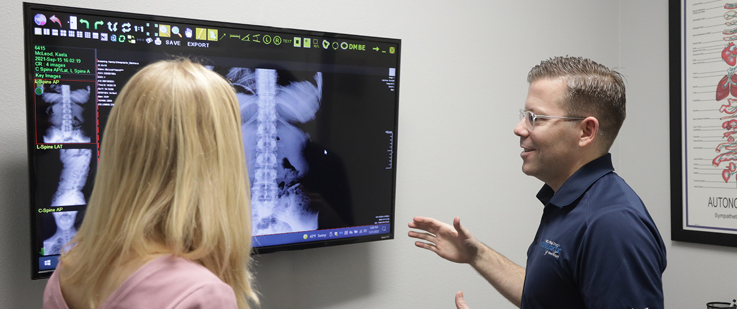 Dr. Browning explaing xray to patient