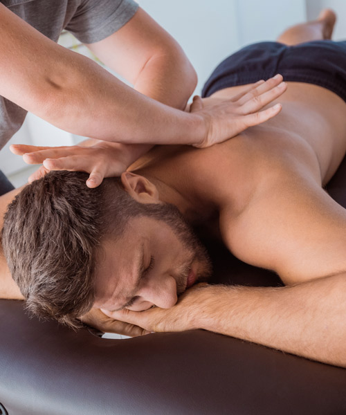 man getting back adjustment