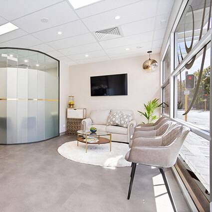 Interior of a chiropractic clinic showing treatment areas