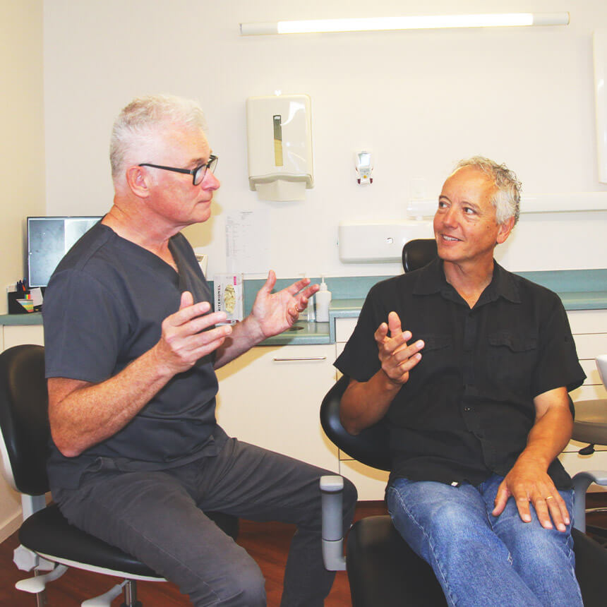 Dr. Keith talking with patient