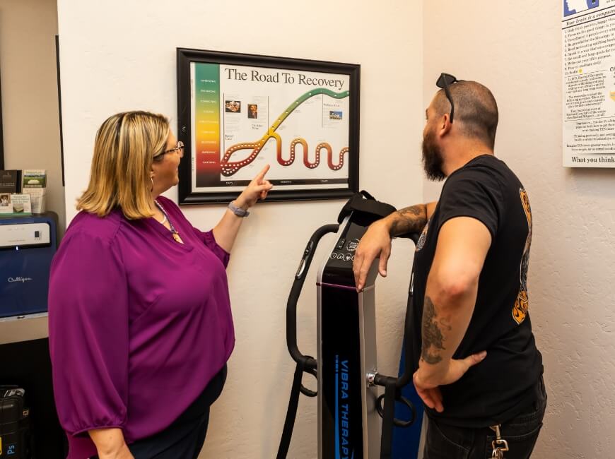 Chiropractor checking patient