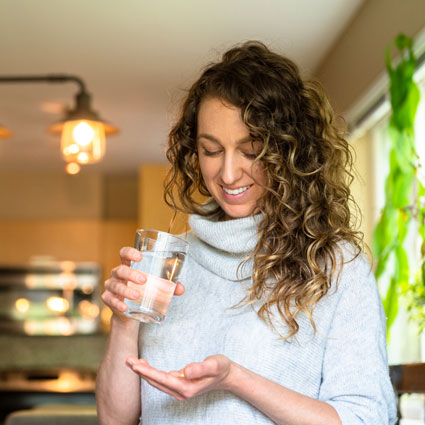 Woman with supplements