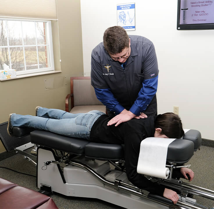Dr. Karvala adjusting patient