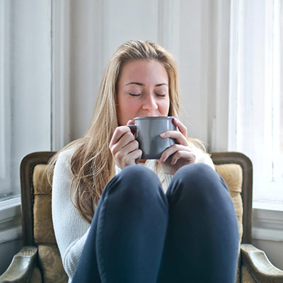 woman relaxing and drinking tea