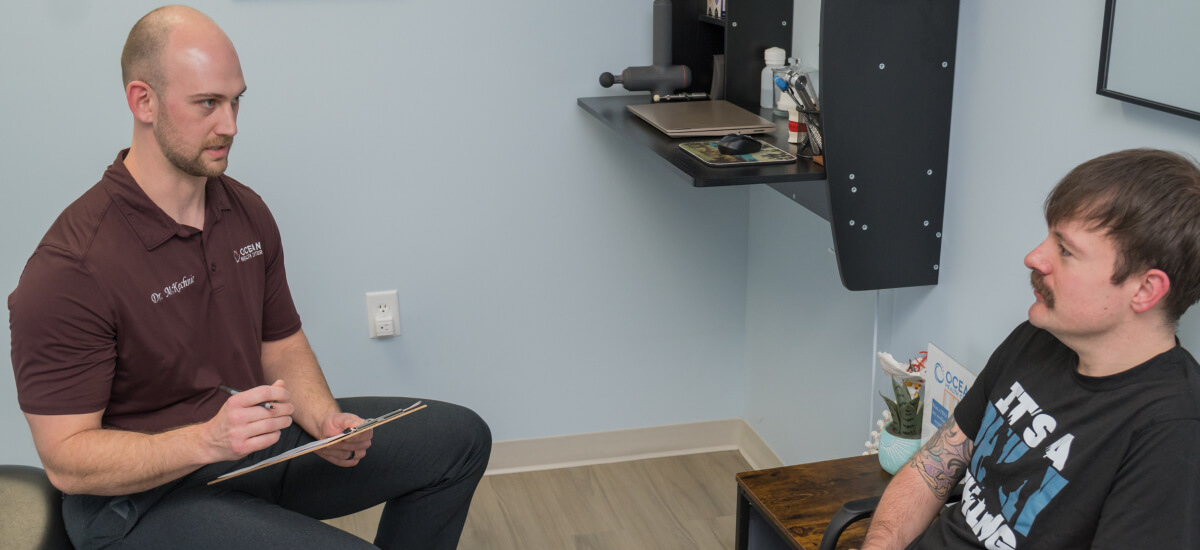 Leland patient in a chiropractic consultation