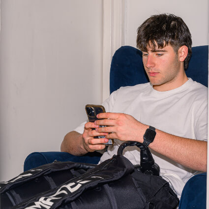 Looking at phone during treatment