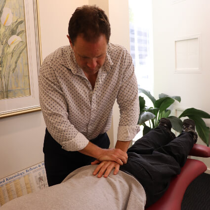 Dr David McRae adjust lower back
