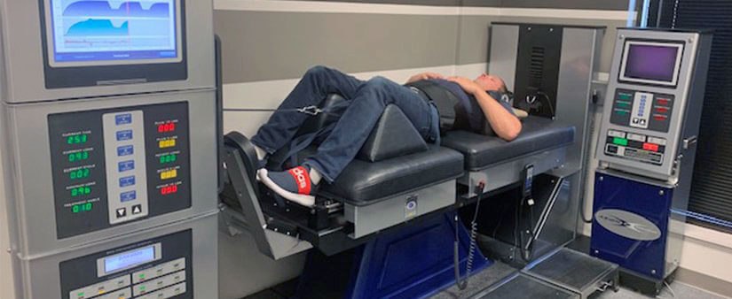 Patient on spinal decompression table