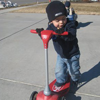 toddler on a scooter