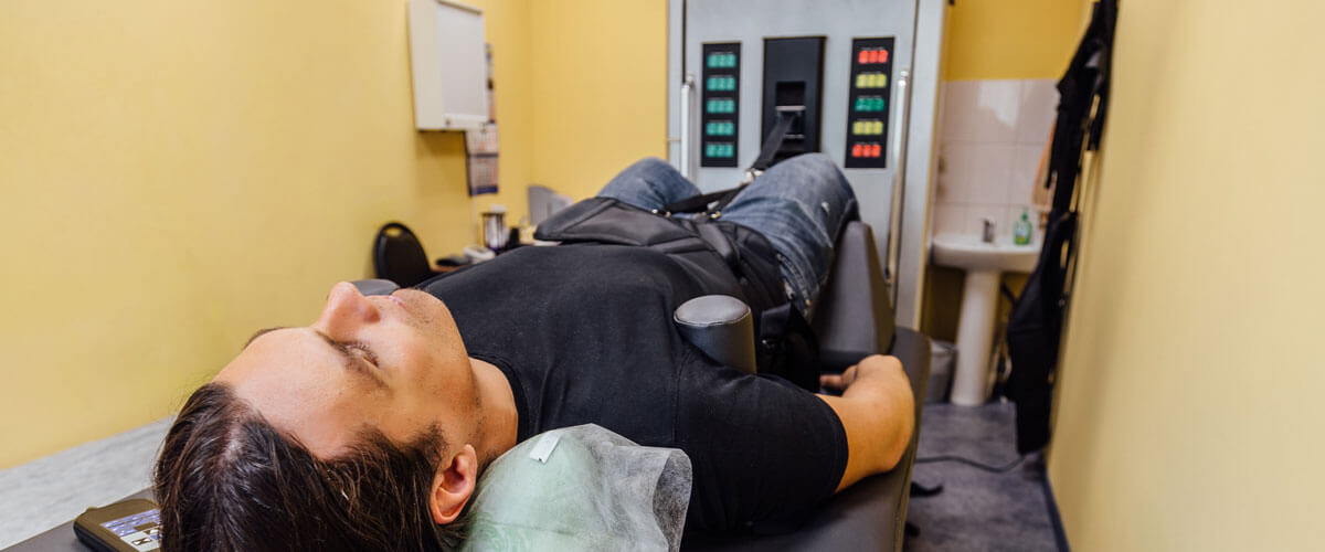 patient on spinal decompression table