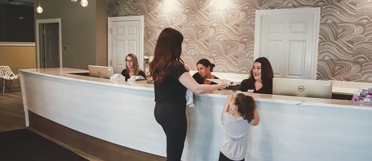 Ladies at reception desk