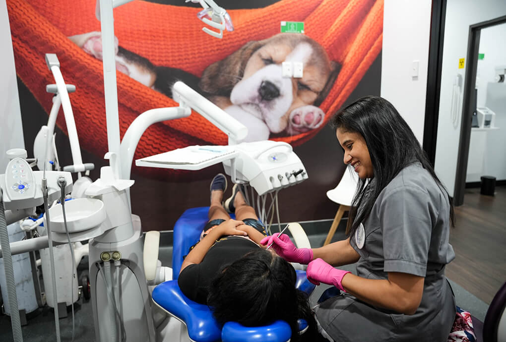 dentist working with child patient