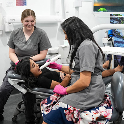 staff with a child patient