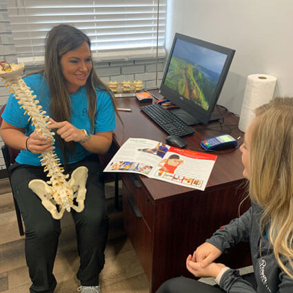 Dr. Jolee talking with patient