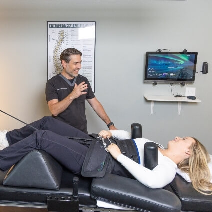Bartram Park chiropractor Dr Gabriel talking with patient