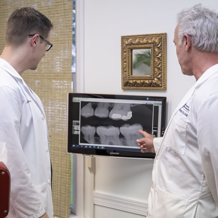 Dentists reviewing xrays