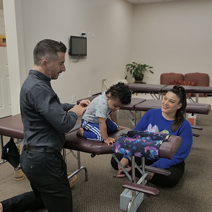 Adjusting child on table