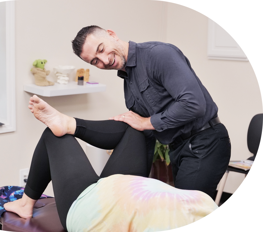 Dr. Matthew stretching pregnant womans hip